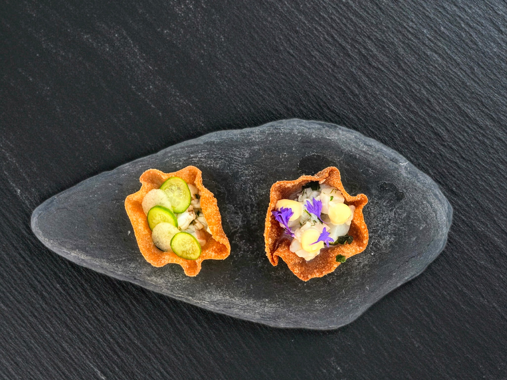 Amuse-bouche duo with edible flowers